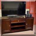 F44. Media console. 28"h x 62"w x 18"d  